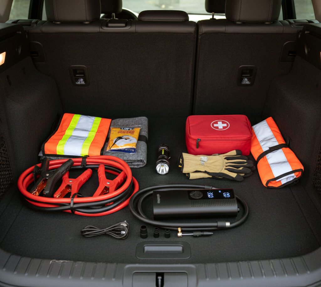 Airmoto tire inflator as part of a car emergency kit for road safety