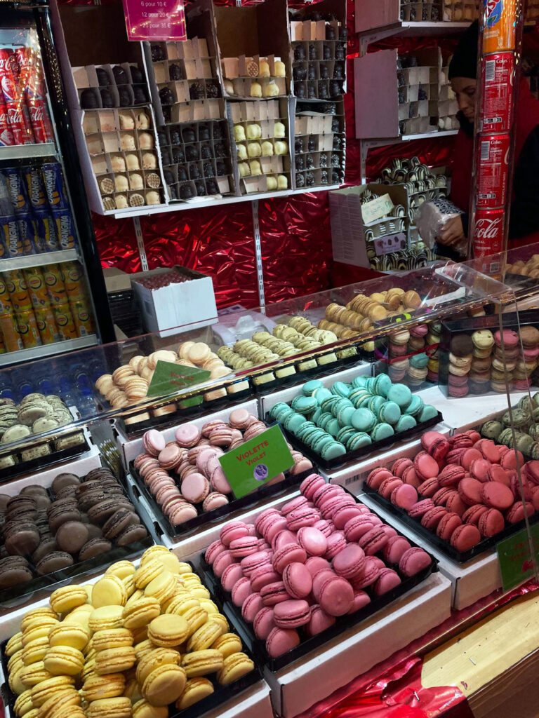 Christmas eating macarons under the Eiffel Tower