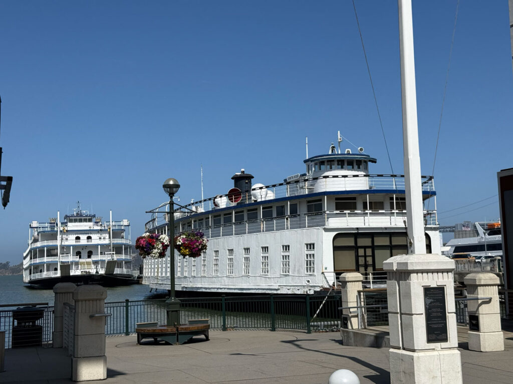 A restored vintage ferry boat docked near Pier 3