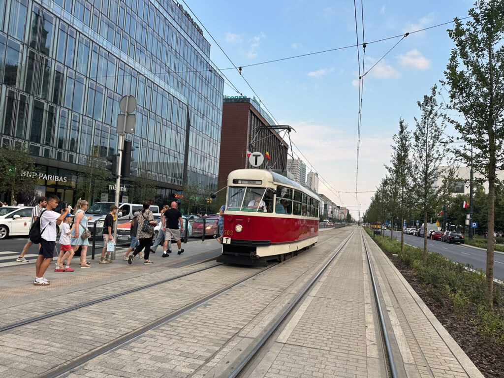 mid-century tram rolls