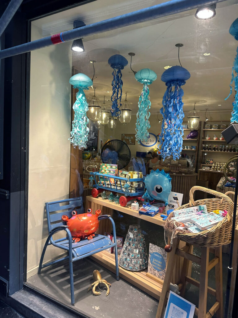 A whimsical gift shop window near the Old Town