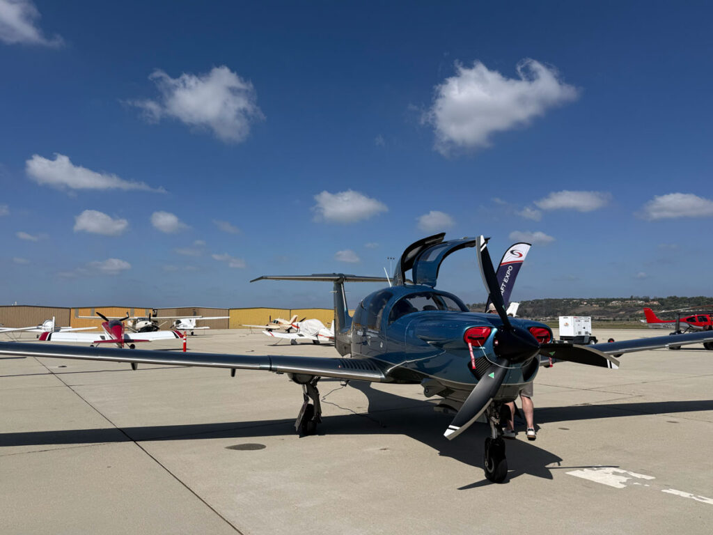 blue single-engine airplane