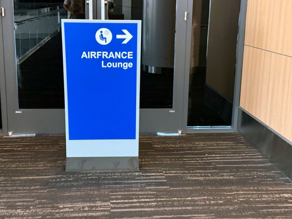 The lounge's directional signage
