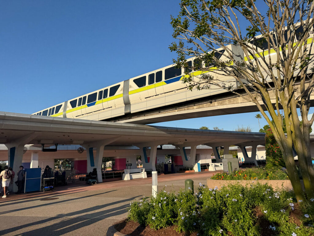 The monorail passing over Epcot's entrance plaza