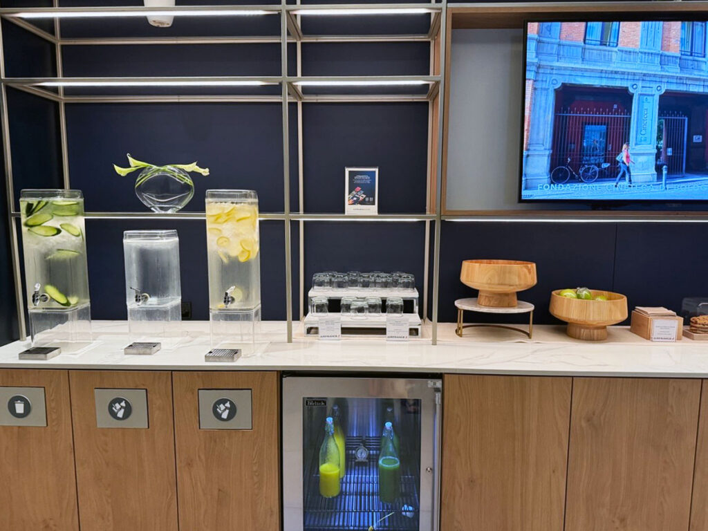 A self-serve refreshment station near the lounge's tea and coffee bar
