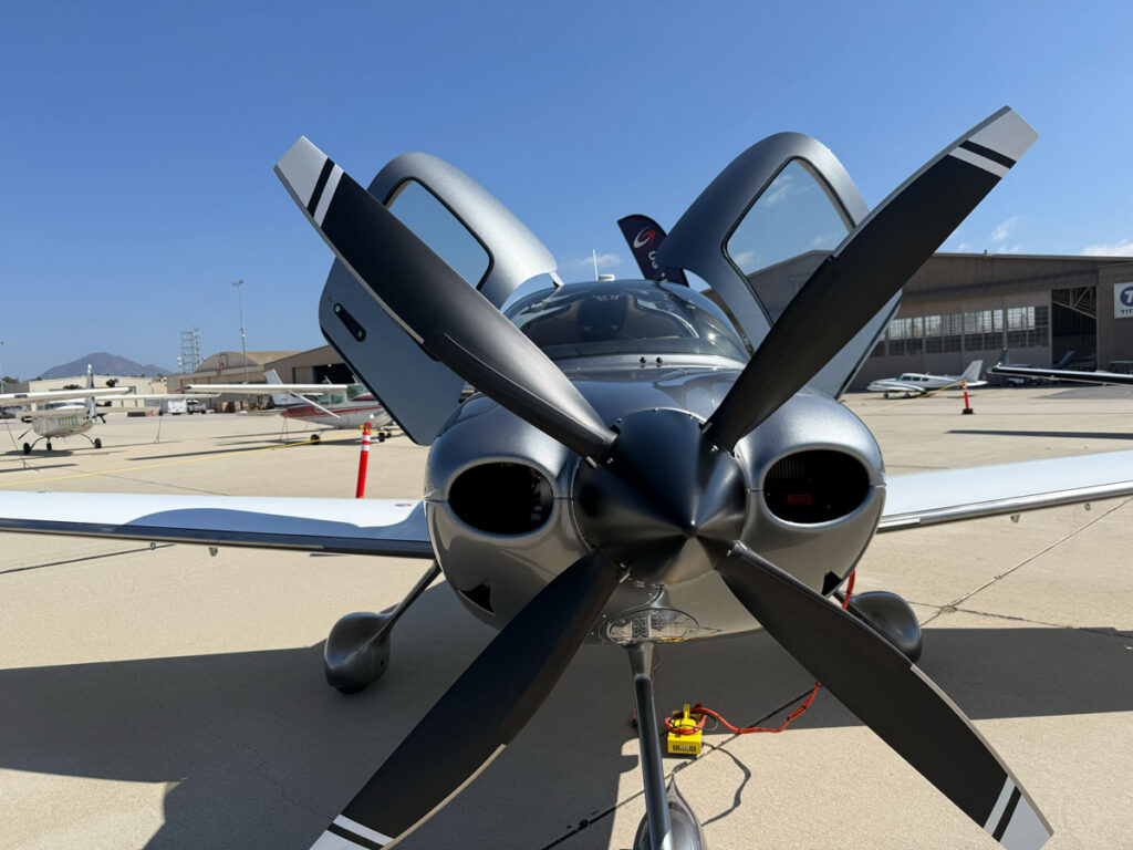 Head-on view of a single-engine airplane