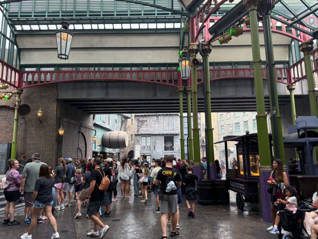 Guests move through a covered passage