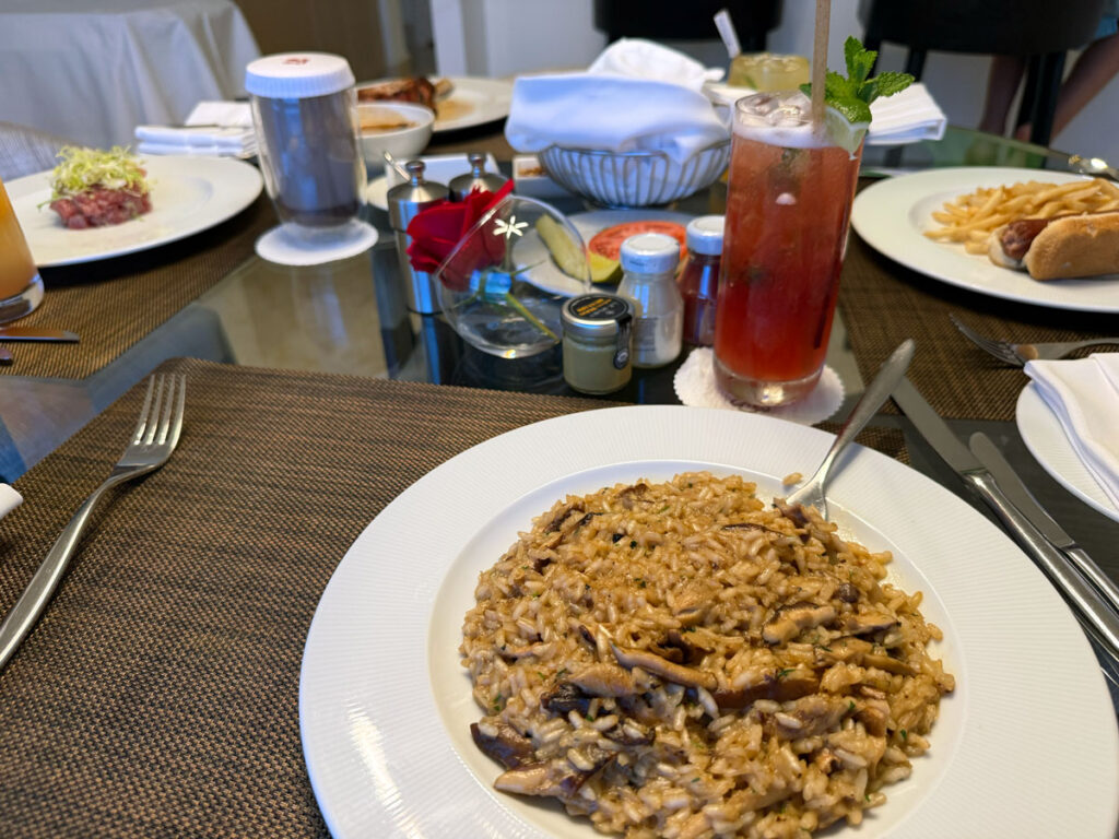 A dinner spread: mushroom risotto