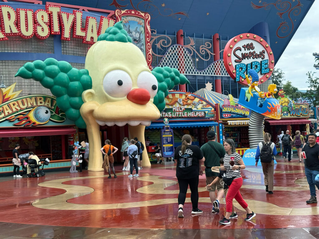 Krusty's giant head greets guests at Krustyland